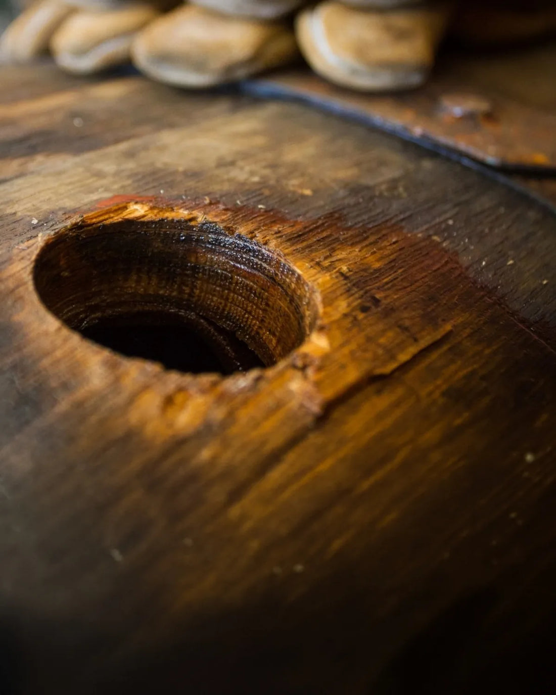 The open bung hole on an oak cask of Cape Ruby Port in the Bezalel Estate cellar