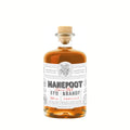 Elegant bottle of Bezalel Hanepoot Brandy with warm golden tones.