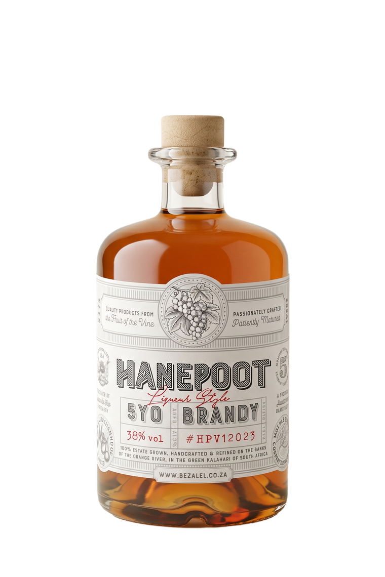 A bottle of Hanepoot 5YO Brandy by Bezalel with a white label and a cork stopper, filled with amber-colored spirit, shown on a plain white background.